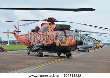 FAIRFORD, UK - JULY 8: Royal Air Force sea King Helicopter participates in the Royal International Air Tattoo airshow event July 8, 2012 near Cirencester, England.