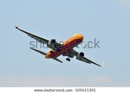 FAIRFORD, UK - JULY 8: DHL 767 aircraft participates in the Royal International Air Tattoo airshow event July 8, 2012 near Cirencester, England.