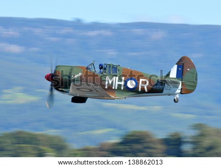 SYDNEY - MAY 5: A Boomerang vintage military fighter performs a flyby during the Wings Over Illawarra Airshow on May, 2013 near Sydney.