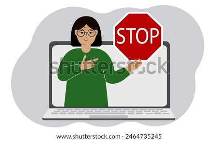 A woman holding a red stop sign in a laptop screen. Virus, attack, error, account or page deletion.