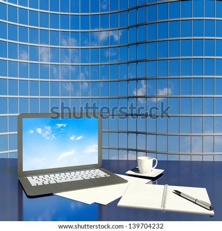 Modern laptop on foreground at empty workplace on architecture background