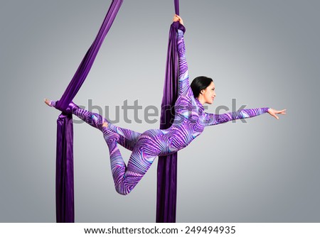 Beautiful dancer on aerial silk, aerial contortion, aerial ribbons, aerial silks, aerial tissues, fabric, ribbon, tissue