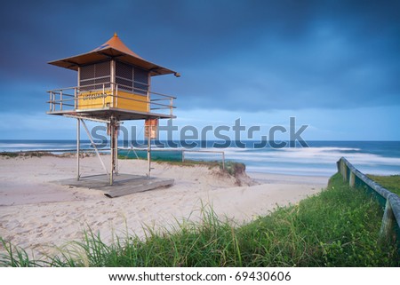 lifeguard hut on australian beach with interesting clouds in background
