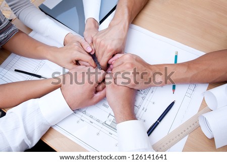 picture of hands  solidarity team