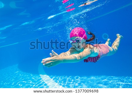 Similar – Foto Bild Kind schwimmt mit Tauchermaske