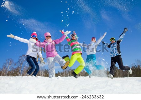 group of friends have a good time in winter resort