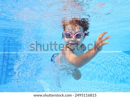 Similar – Foto Bild Kind schwimmt mit Tauchermaske