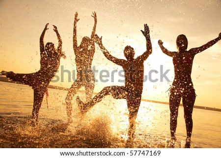 Similar – Image, Stock Photo Friends splashing with water guns