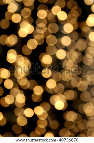 Festive light chain color spots in dark background