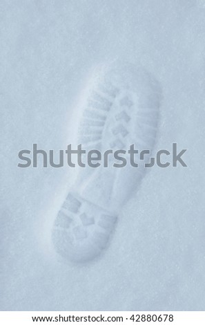 Boot footprint pattern in pure white winter snow