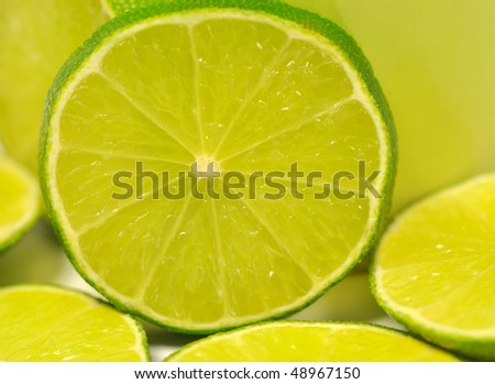 fresh and juicy limes cut open