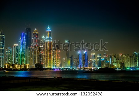 DUBAI, UAE - NOVEMBER 13: Dubai downtown night scene with city lights, luxury new high tech town in United Arab Emirates architecture  on November 13, 2012 in Dubai, UAE. . Dubai Marina cityscape, UAE