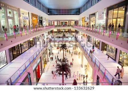 DUBAI, UAE - NOVEMBER 14: Shoppers at Dubai Mall on Nov 14 2012 in Dubai. At over 12 million sq ft, it is the world\'s largest shopping mall based on total area and 6th largest by gross leasable area.