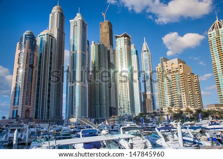 DUBAI, UAE - NOVEMBER 13: Modern buildings in Dubai Marina, Dubai, UAE. In the city of artificial channel length of 3 kilometers along the Persian Gulf, taken on 13 November 2012 in Dubai.
