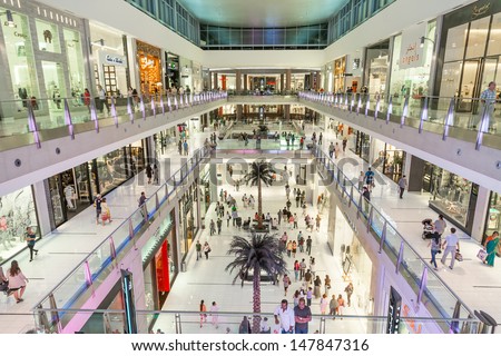 DUBAI, UAE - NOVEMBER 14: Shoppers at Dubai Mall on Nov 15, 2012 in Dubai. At over 12 million sq ft, it is the world\'s largest shopping mall based on total area and 6th largest by gross leasable area.
