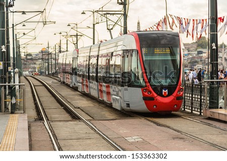 ISTANBUL - JULY 25 A modern tram on July 25, 2013 in Istanbul. Due to increasing traffic & air pollution, Istanbul became one of most polluted city also planned for return of tram.