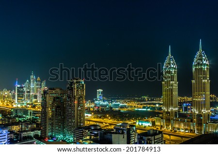 DUBAI, UAE - NOVEMBER 13: Modern skyscrapers in Dubai (emirate and city), UAE. Dubai now boasts more completed skyscrapers higher than 0,8 - 0,25 km than any other city on 13 November 2012 in Dubai.