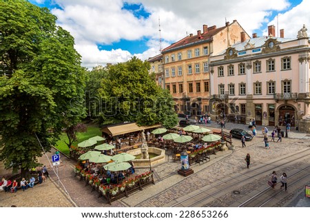 LVOV, UKRAINE - MAY 11: Market square - historical and tourist centre of the town on May 11, 2014  in Lvov, Ukraine. Historical centre of Lvov is UNESCO World Heritage Site.