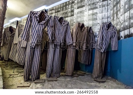 OSWIECIM, POLAND - JULY 22: Exhibition with prisoners\' clothes in Auschwitz. It is the biggest nazi concentration camp in Europe on July 22, 2014 in Oswiecim, Poland