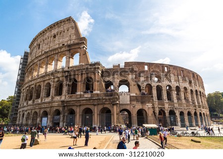 ROME - JULY 12: The Colosseum is a main tourist attraction in Rome in a summer day in Italy on July 12, 2014