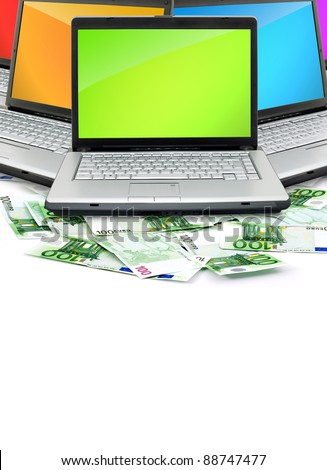 Open laptop with money  isolated on white background