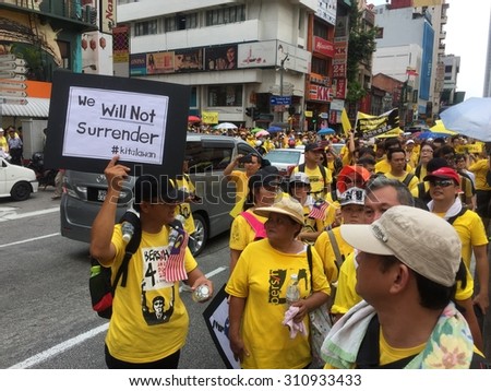 Kuala Lumpur, Malayia 29 August 2015 : Yellow shirt Supporters displaying banners supporting Bersih 4 Rally for Free Fair Elections. Bersih organized Rallies 29/30 August in cities around Malaysia