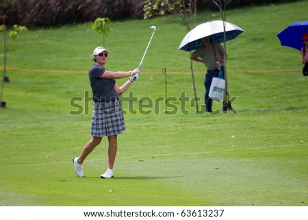 KUALA LUMPUR, MALAYSIA - OCTOBER 24: Swedish Maria Hjorth finishes her swing on Day 3 of the Sime Darby LPGA Golf on October 24, 2010 in Kuala Lumpur, Malaysia. Hjorth finish joint 3rd