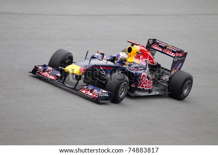 SEPANG, MALAYSIA - APRIL 8: German Sebastian Vettel of Red Bull Racing at the back straight during Friday practice at Petronas Formula 1 Grand Prix on April 8, 2011 in Sepang, Malaysia