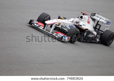 SEPANG, MALAYSIA - APRIL 8: Japanese Kamui Kobayashi of Sauber at the back straight during Friday practice at Petronas Formula 1 Grand Prix on April 8, 2011 in Sepang, Malaysia