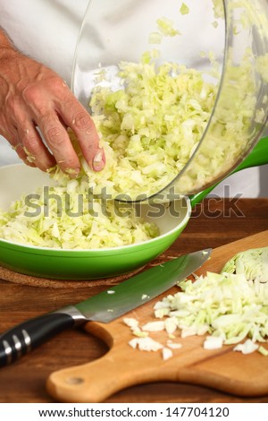 Fried Cabbage. Making. Transfer Cabbage to Frying Pan.