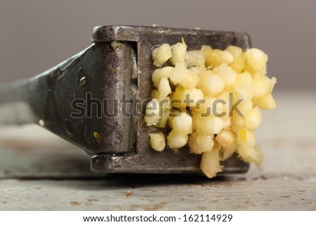 Garlic crushed and garlic press