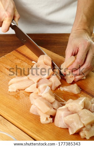 Cutting Chicken Fillet. Making oven baked corn flake crumbs chicken nuggets. Series.