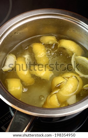 Simmer lemon peel into syrup. Candied Lemon Zest Cooking. Series.