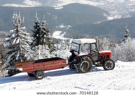 Tractor with trailer in winter
