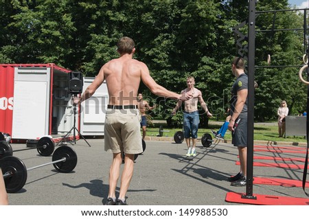 RUSSIA, MOSCOW-JULY 13: Unidentified athletes warming up on the Sports festival \