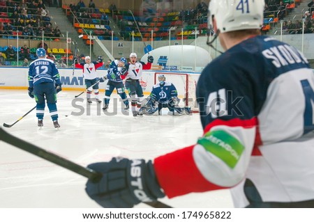 MOSCOW - JANUARY 28, 2014: Players of Slovan (Bratislava) celebrate after scoring during the KHL regular Hockey match Dynamo (Moscow) - Slovan (Bratislava) in sports palace Luzhniki. Final score 2:3