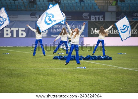 MOSCOW - DECEMBER 7 A cheerleading flash mob dance troupe peform before the football match Dynamo (Moscow) vs Amkar (Perm) on Russian Premier League on December 7, 2014, in Moscow, Russia
