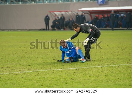 MOSCOW - DECEMBER 7: Player Dynamo was injured on the football match on Russian Premier League Dynamo (Moscow) (blue) vs Amkar (Perm) (White) on December 7, 2014, in Moscow, Russia. Dynamo won 5: 1