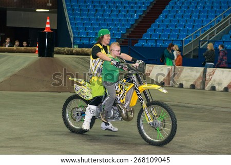 MOSCOW - MARCH 13:FMX  motofristayler Daice Suzuki and participants of the International Social and charitable project MOTOTERAPIYA on March 13, 2015, in Moscow, Russia. Sports Complex Olimpiyskiy