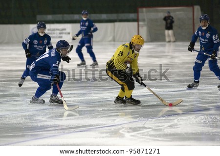 MOSCOW - FEBRUARY 22: Unidentified men play in a hockey match, Dynamo (blue) vs. Moorman (yellow), in ice sports palace Krylatskoye on February 22, 2012 in Moscow, Russia. Dynamo won 11 - 3