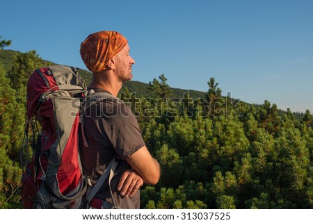Relaxing hiker in the evening light