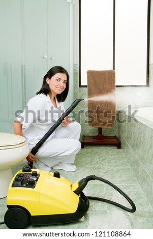 Professional cleaning lady clean bathrooom.