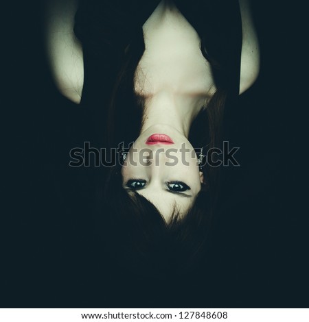 Horror Scene of a Woman Possessed, upside down