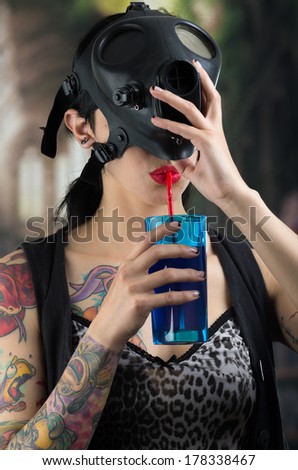 Sexy Woman wearing a Ammo Gas Mask