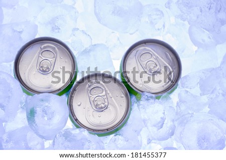 green Cans of Beer in Ice Cubes