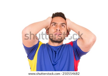 angry soccer fan wearing blue tshirt watching game gesturing desperation isolated on white