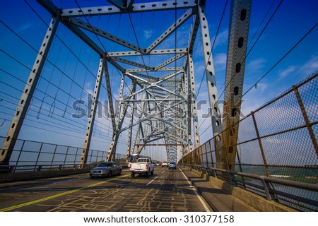 PANAMA, PANAMA - APRIL 19, 2015:  The Bridge of the Americas is a road bridge in Panama, which spans the Pacific entrance to the Panama Canal in Panama City