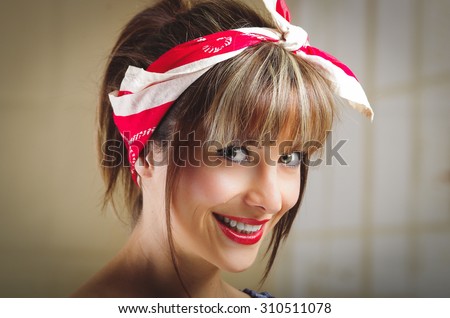 Closeup portrait of beautiful pinup girl with vintage style