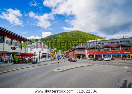 VALDRES, NORWAY - 6 JULY, 2015: Charming small town of Fagernes with small city buildings sorrounded by green mountains.