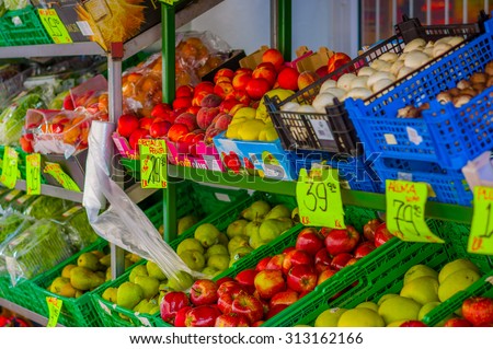 OSLO, NORWAY - 8 JULY, 2015: Typical vegetable market in Torggata where many immigrants run successfull food related businesses with a great variety of products.